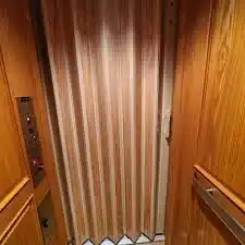 custom designed residential elevator gate for unique interiors