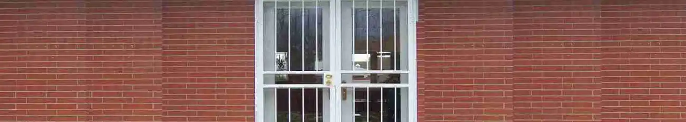 Durable expanded metal door grille providing added security