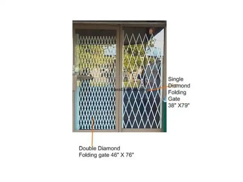 Steel barrier folded to secure storefront entrance