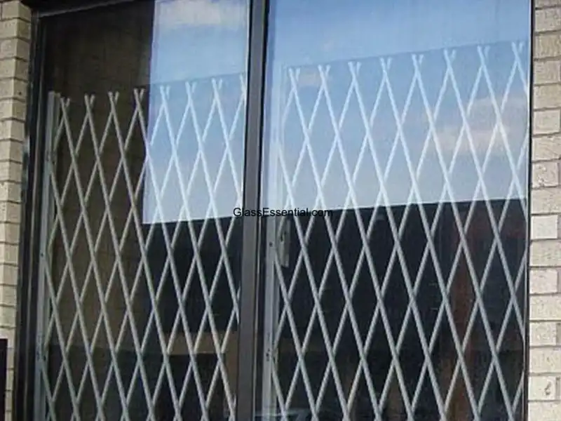 Durable storefront protection with a folding gate