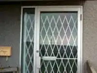 Folding security gate with durable construction