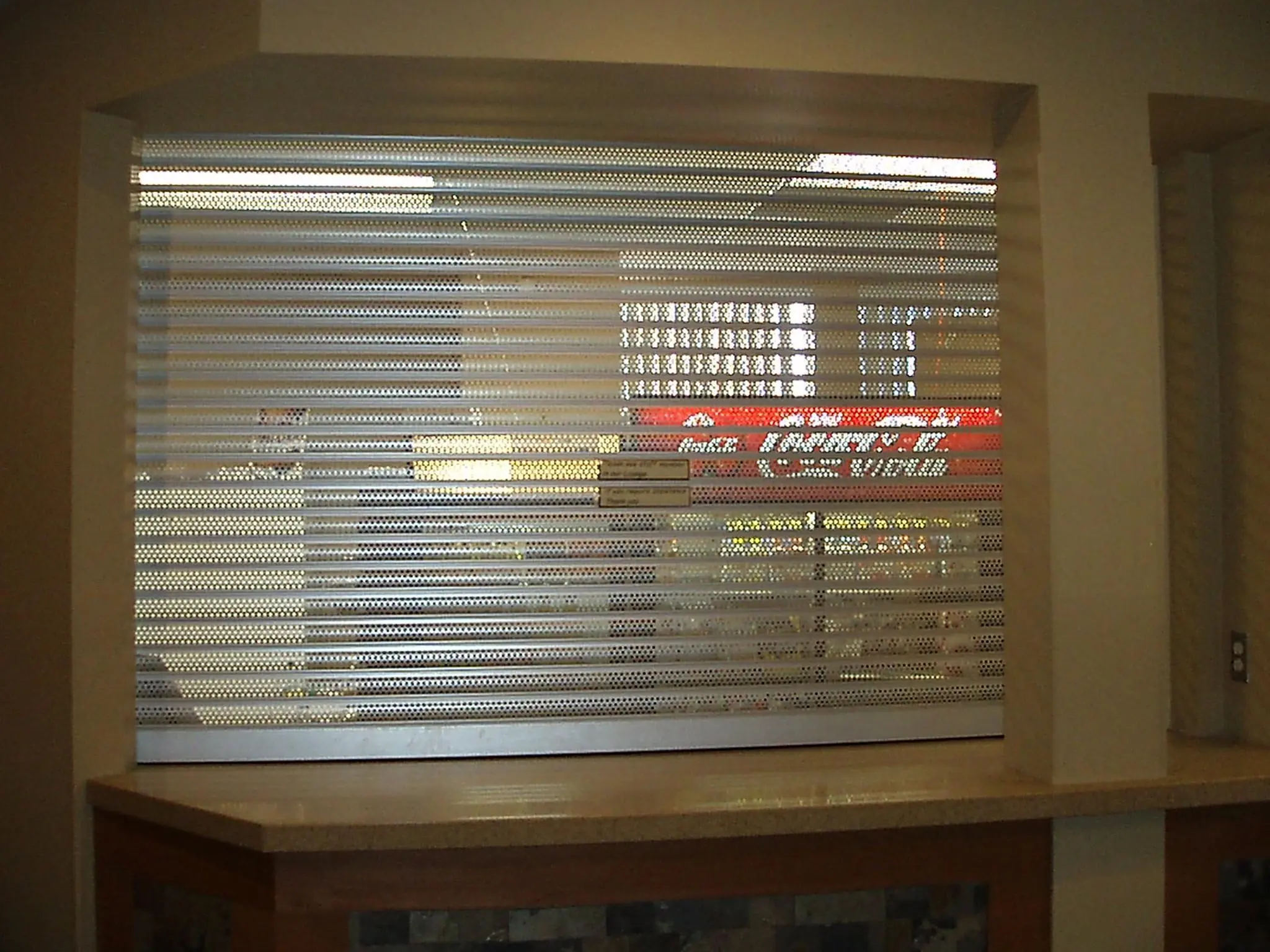Small Perforated Grille Type enhances the contemporary appeal of Roll Up Shutters Model 561 Series for a stylish solution