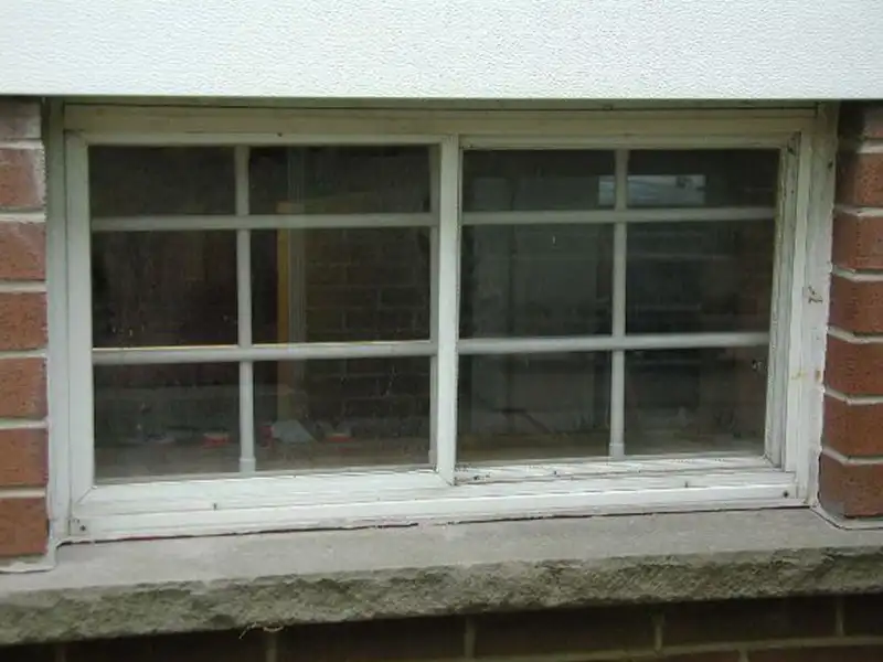 Decorative window security grille with Colonial design, blending style and protection seamlessly.