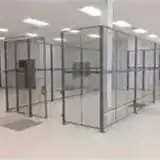 Wire mesh partition system providing a flexible and secure solution for warehouse organization.